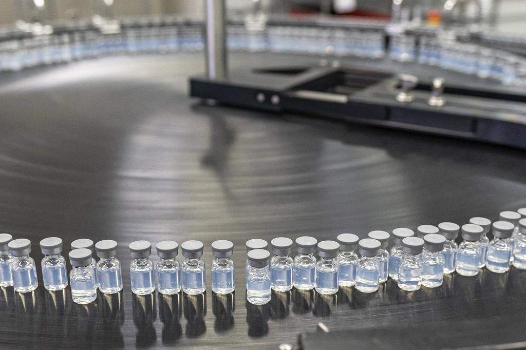 August 2022 photo provided by Pfizer shows vials of the company's updated COVID-19 vaccine.