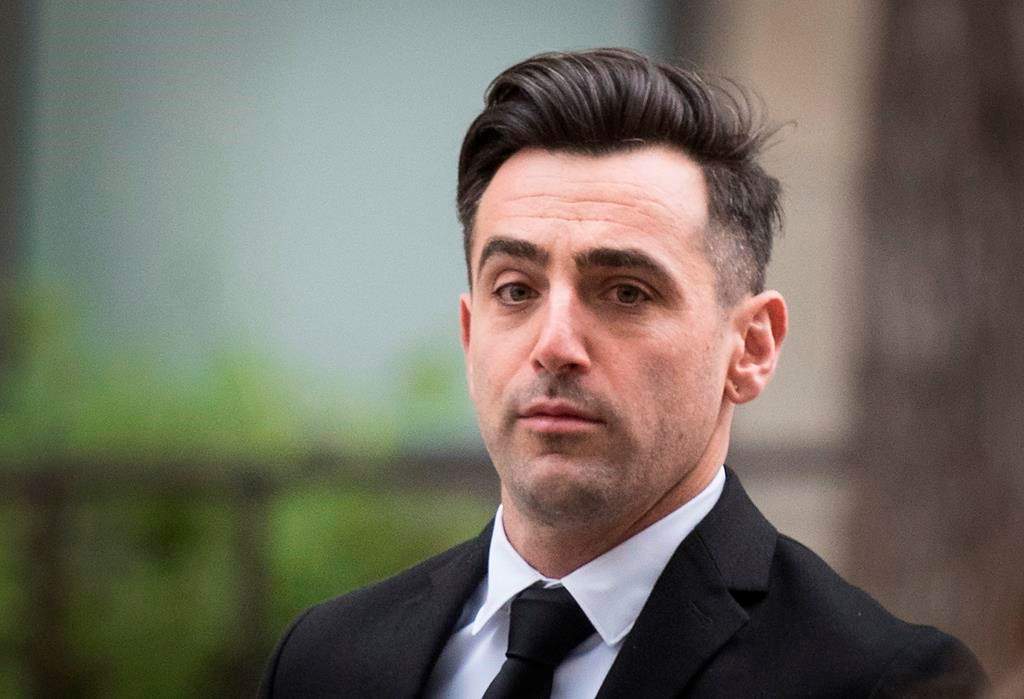 Canadian musician Jacob Hoggard arrives at the Toronto courthouse for sentencing after being found guilty earlier this year of sexually assaulting an Ottawa woman, on Thursday, October 20, 2022. THE CANADIAN PRESS/ Tijana Martin.