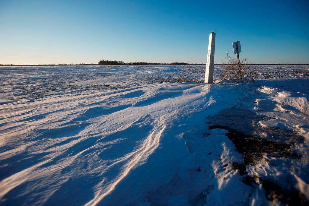 A border marker is shown just outside of Emerson, Man., Thursday, Jan. 20, 2022.