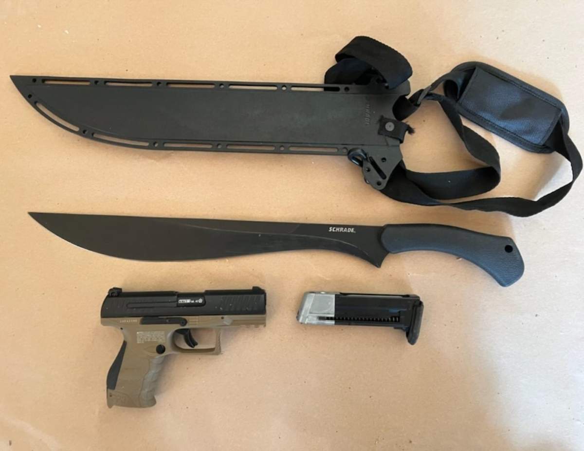 Port Hope police say a man was in possession of weapons following an armed robbery at a pharmacy on Oct. 18, 2022. He was arrested following a short pursuit by vehicle and foot.