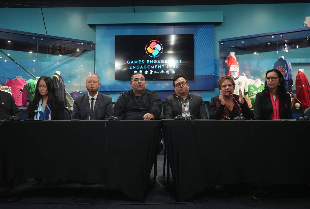 Canadian Paralympic Committee vice president Gail Hamamoto, from left to right, Whistler Mayor Jack Crompton, Musqueam Indian Band Chief Wayne Sparrow, Squamish Nation councillor Wilson Williams, Tsleil-Waututh Nation Chief Jen Thomas and Canadian Olympic Committee president Tricia Smith attend a news conference about their 2030 Olympic bid, in Vancouver, B.C., Friday, Oct. 28, 2022. The government of B.C. said it will not support an Indigenous-led bid to host the 2030 Olympics in the province. 