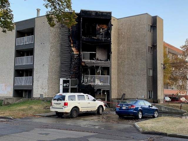 Fire damaged an apartment building at 10368 92 St. in Edmonton's Boyle Street neighbourhood on Monday, Oct. 17, 2022.