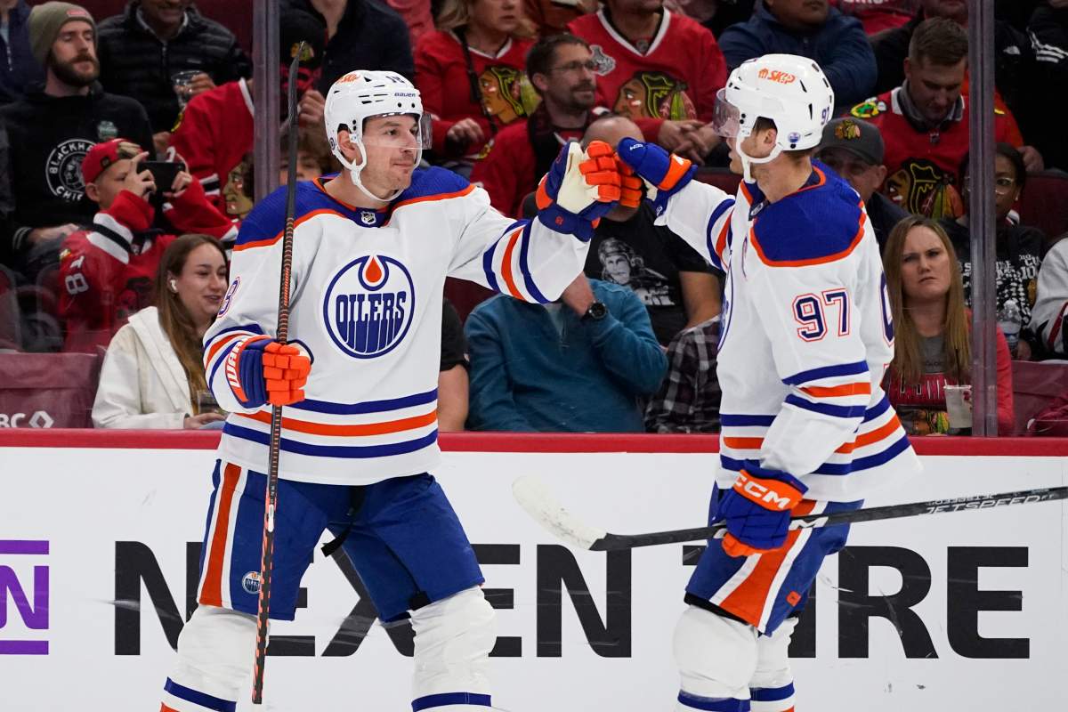 Oilers win 6-5 in Chicago