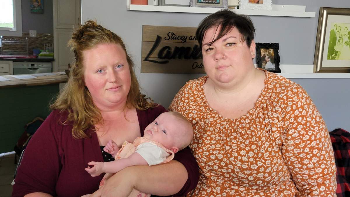 Caitlin and Stacey Lamrock with their daughter, Gwendolyn.