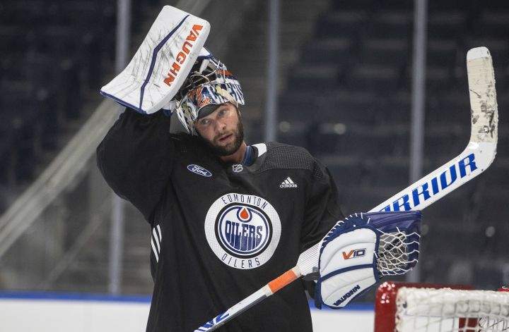 Goalie Jack Campbell (36) takes a break during the Edmonton Oilers training camp in Edmonton, Thursday, Sept. 22, 2022.