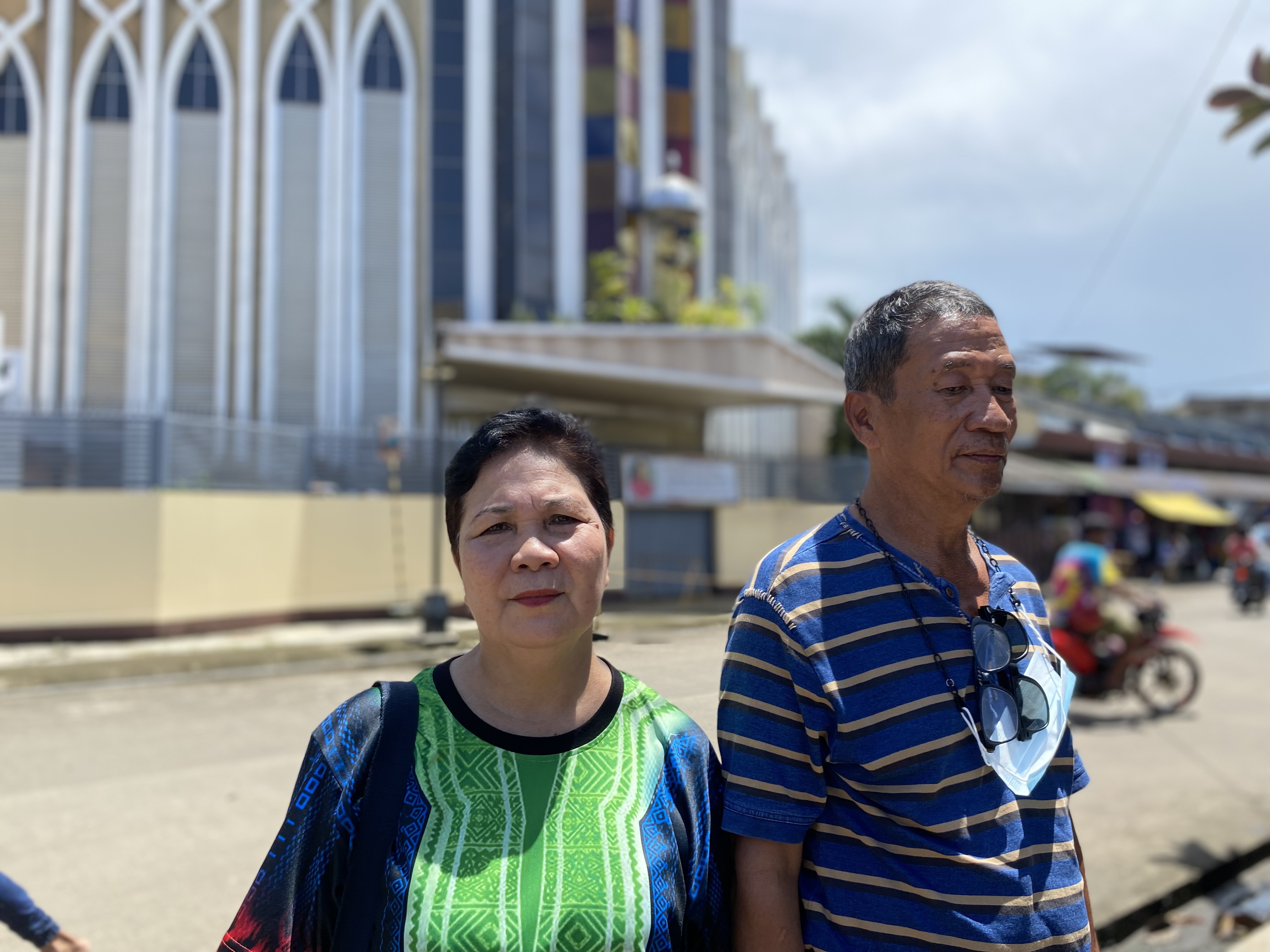 Delia Hoe and husband Rod outside the Jolo cathedral, bombed by Abu Sayyaf in 2019.