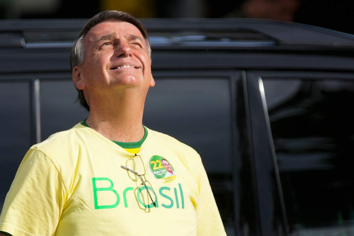 Brazilian President Jair Bolsonaro, who is running for another term, arrives to vote in a second round presidential election in Rio de Janeiro, Brazil, Sunday, Oct. 30, 2022.