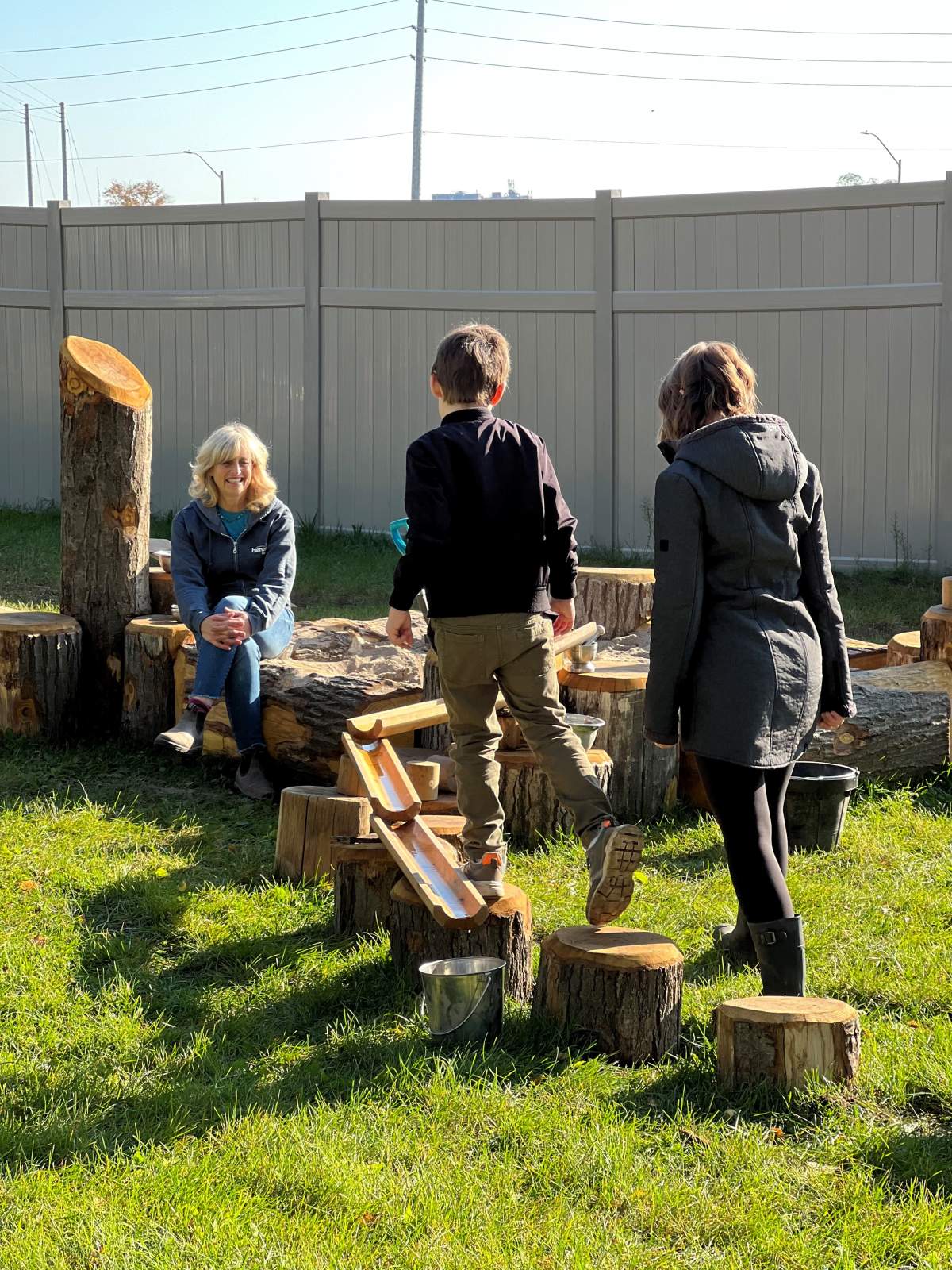 Jill Bienenstock with children at On Solid Ground in Barrie on Oct. 11, 2022
