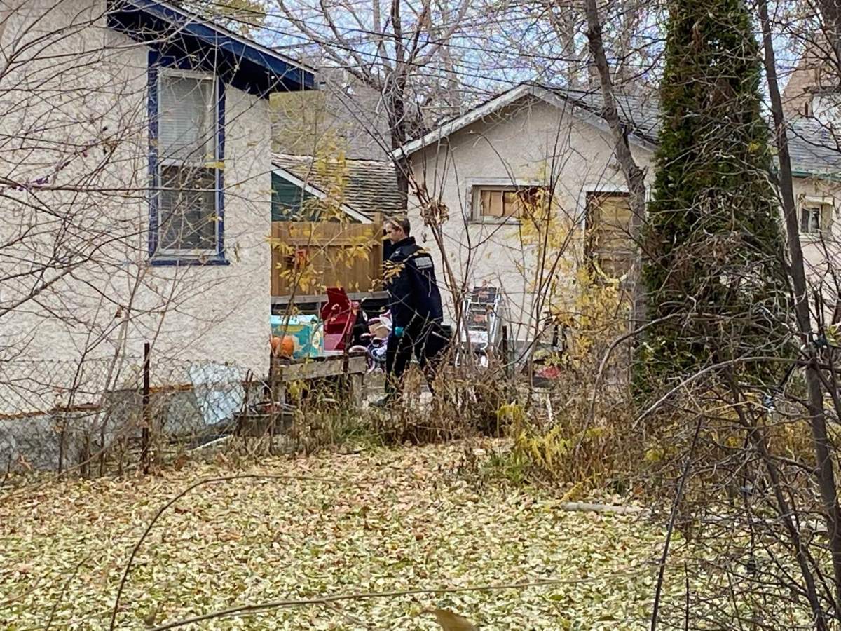 Forensics investigators at the scene of Winnipeg’s 44th homicide of the year.
