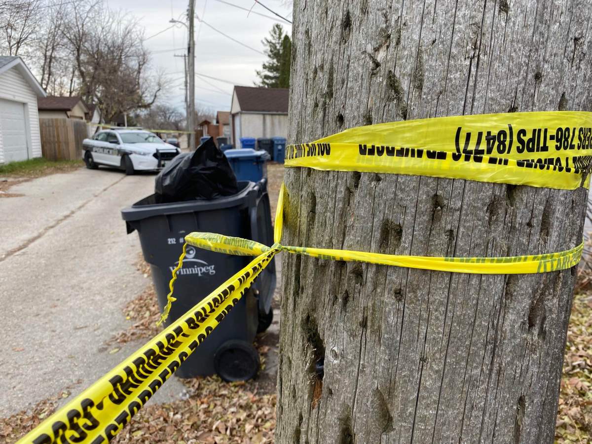 Forensics investigators at the scene of Winnipeg’s 44th homicide of the year.