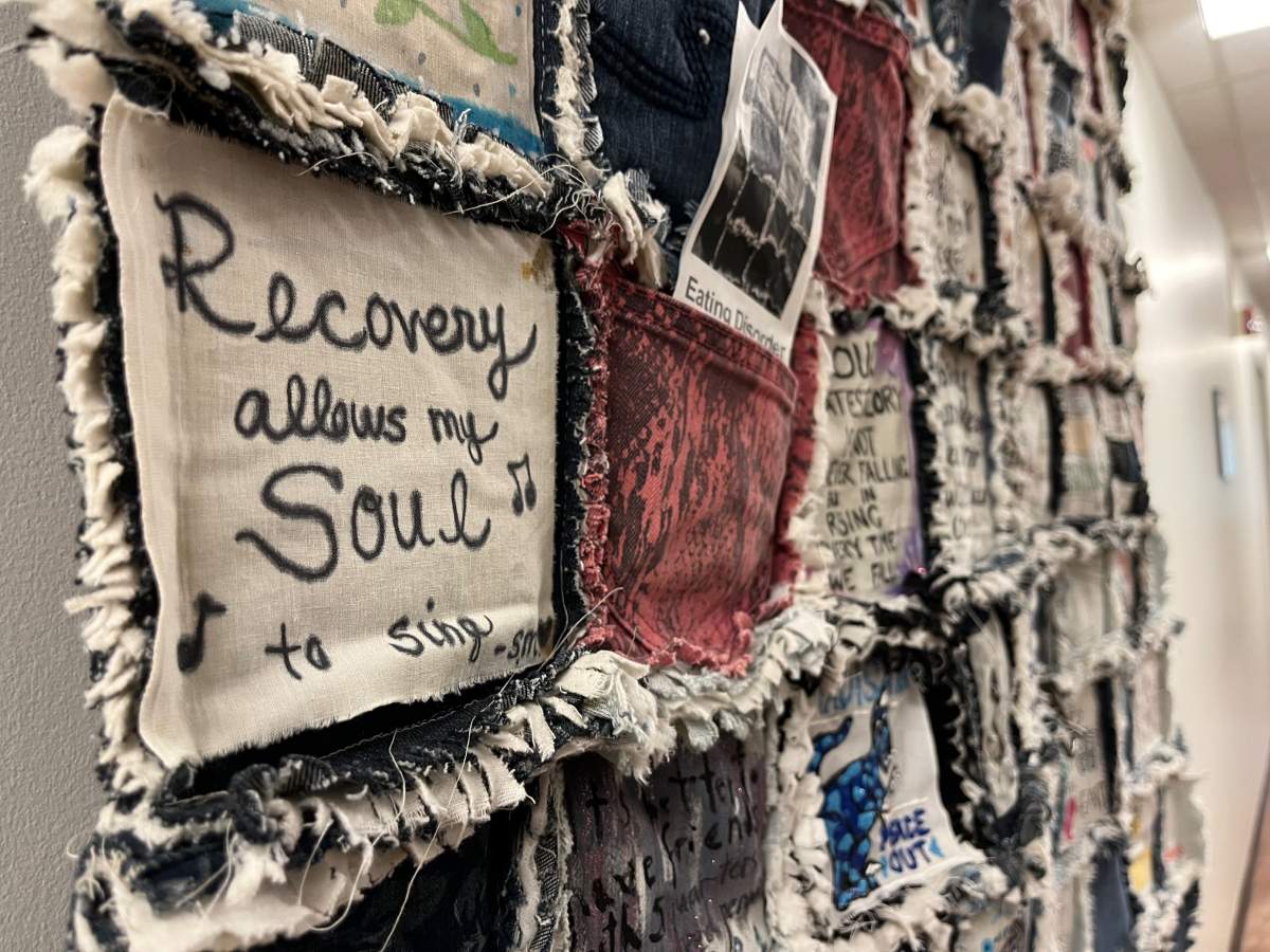 A quilt inside the AEDS clinic that’s made up of patches of jeans from patients who had a successful journey in treating their eating disorder.
