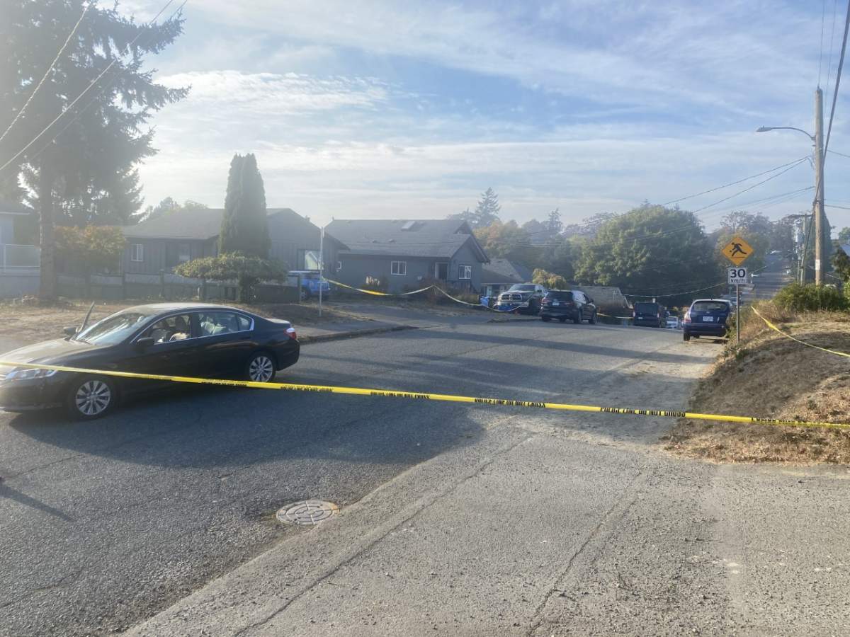 Police were seen at a home in Saanich, B.C., conducting an investigation.