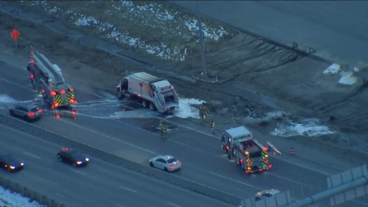 A city of Calgary garbage truck after being hit with water and foam by Calgary firefighters due to it catching fire earlier in the morning.