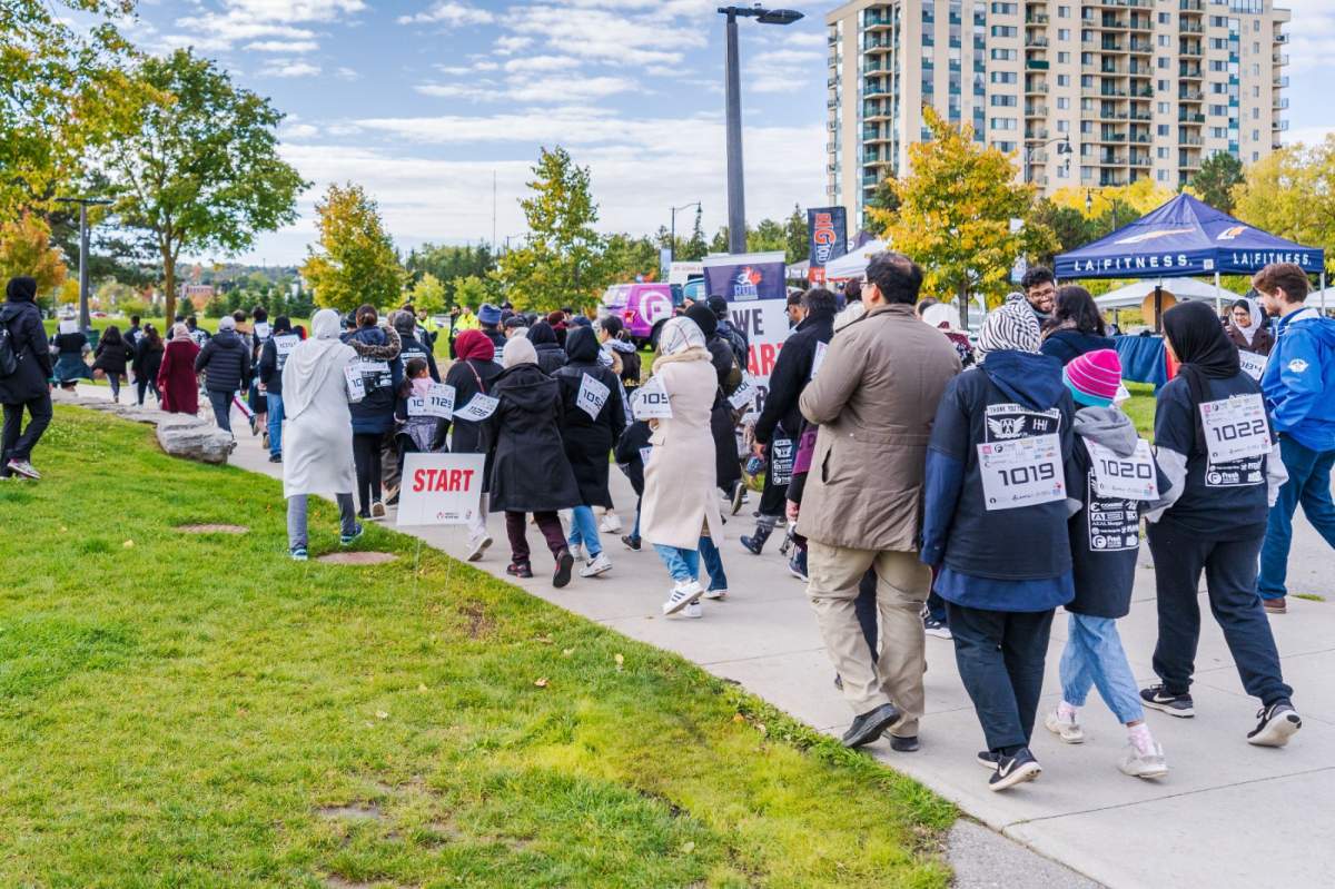 Residents walking at the Run for Barrie at Centennial Park. Oct. 9, 2022