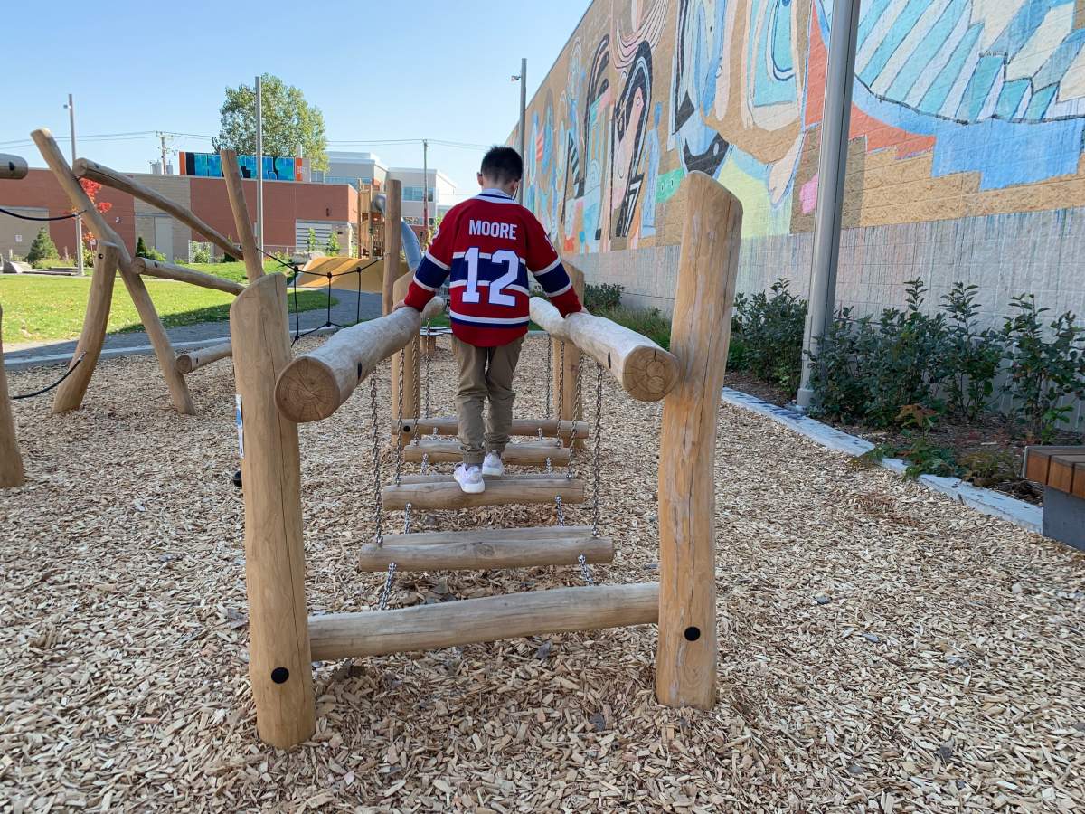 William Easterbrook, Dickie Moore's nephew, plays at his uncle's eponymous park, inaugurated in the Parc-Extension neighborhood. Wednesday Oct. 5, 2022.