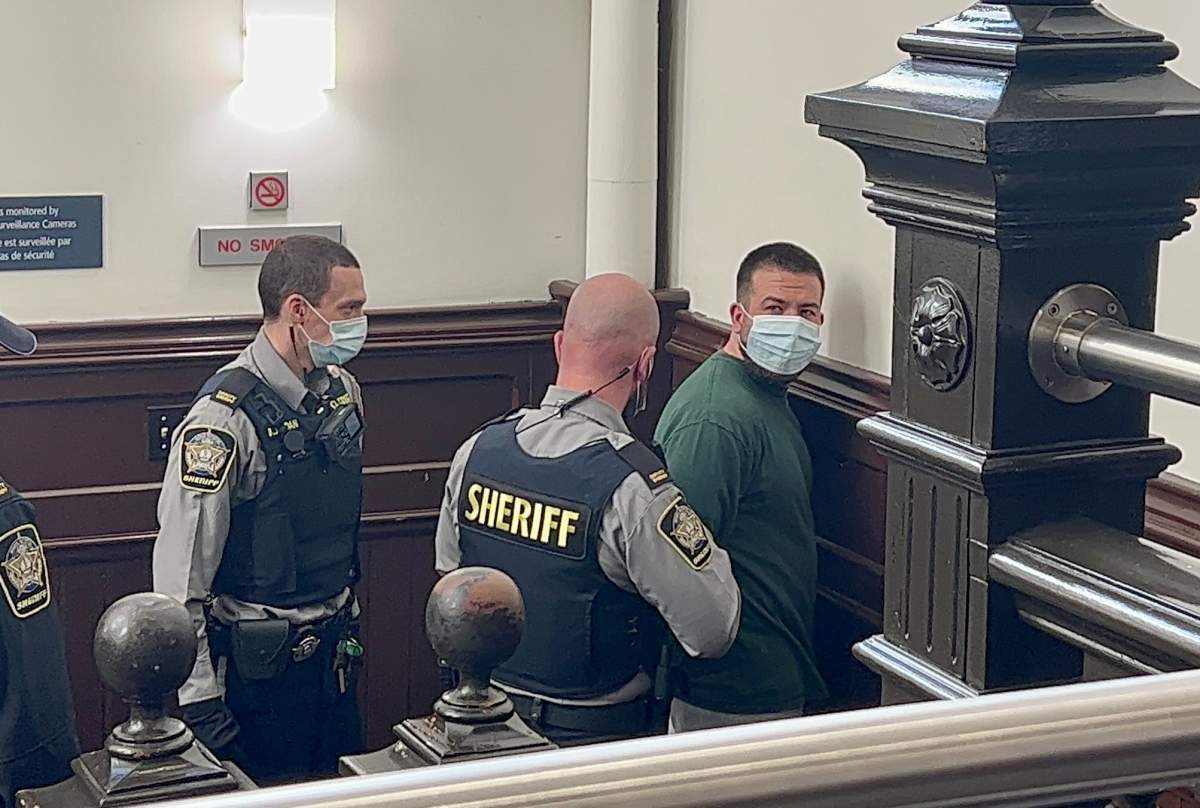 Adam Drake is seen before entering the courtroom on Oct. 31, 2022.