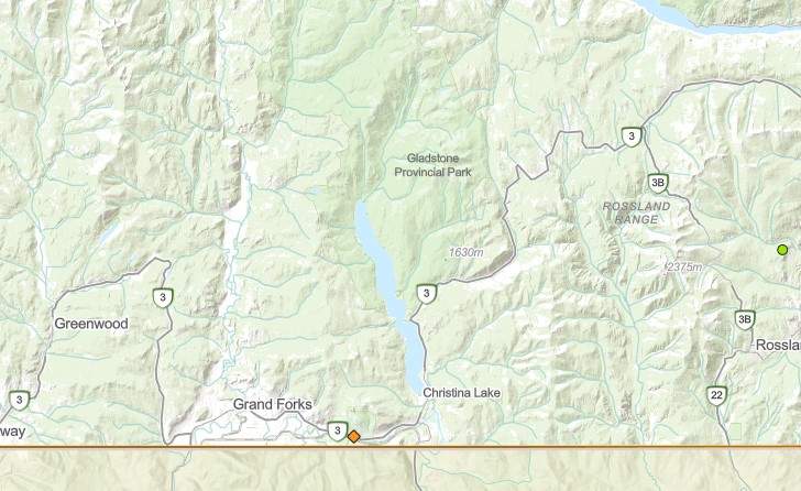 Wildfire near Grand Forks along Highway 3.