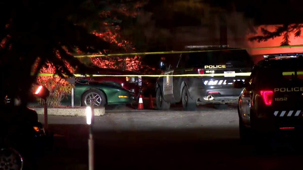 Calgary police were called to a parking lot in Canyon Meadows on Oct. 28, 2022 when police said a man inside a suspicious vehicle shot at a police officer.