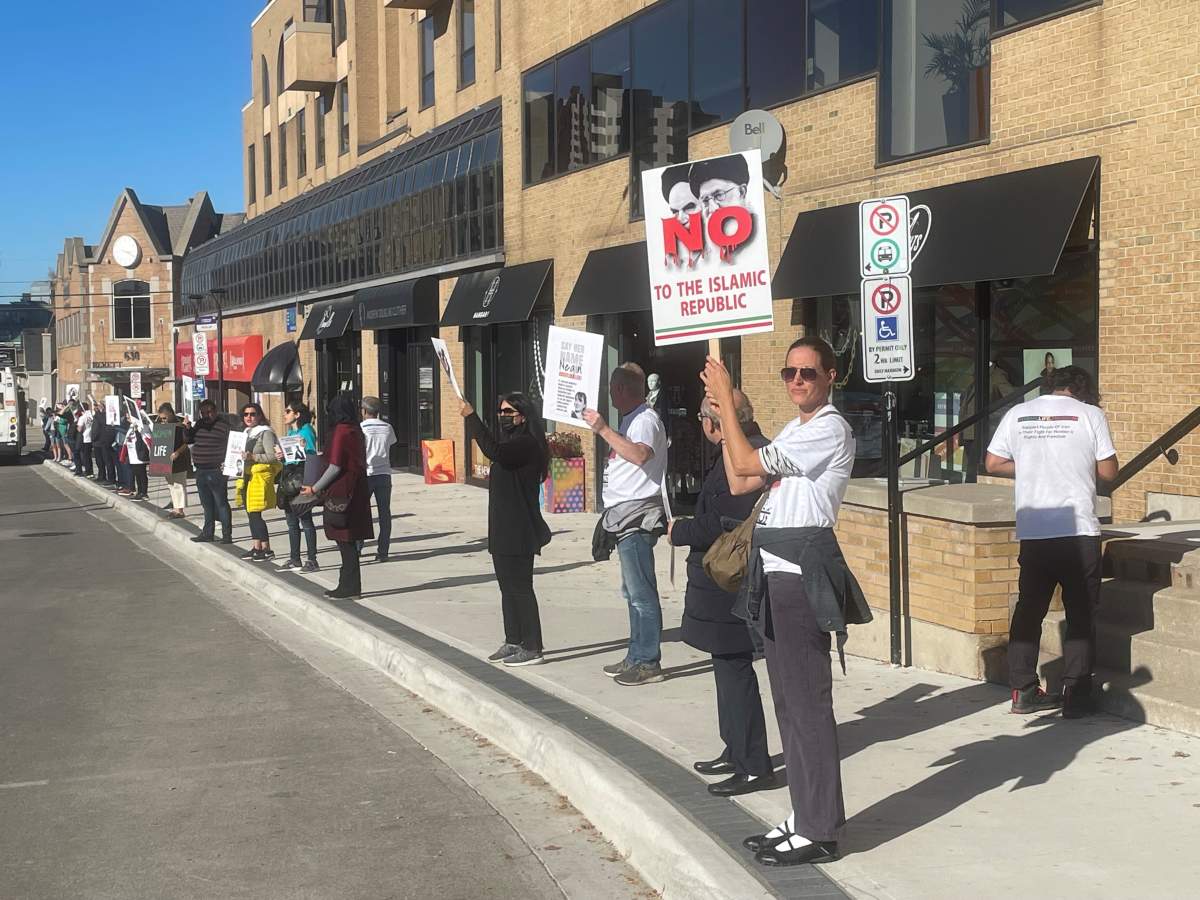 Iranian-Canadians and supporters line Richmond Street. 