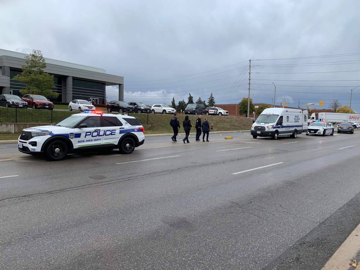 Police on scene following a fatal pedestrian-involved collision near Tomken and Britannia roads in Mississauga.