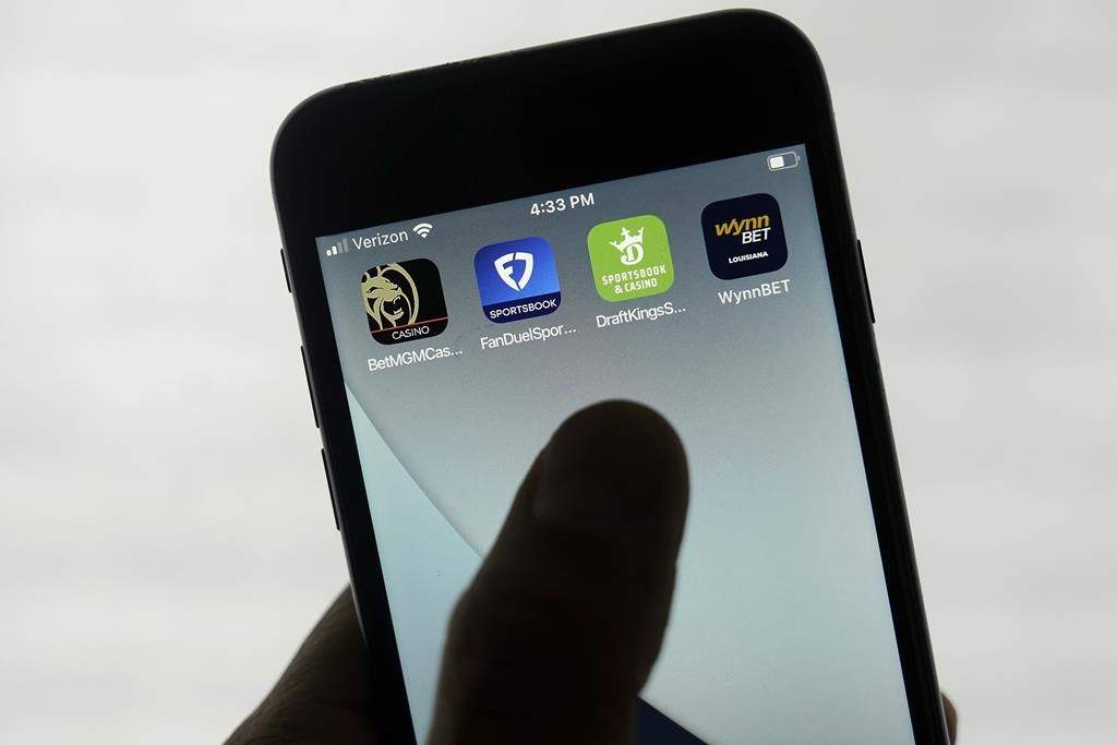 FanDuel, DraftKings and other online gambling apps are displayed on a phone in San Francisco, Monday, Sept. 26, 2022. 