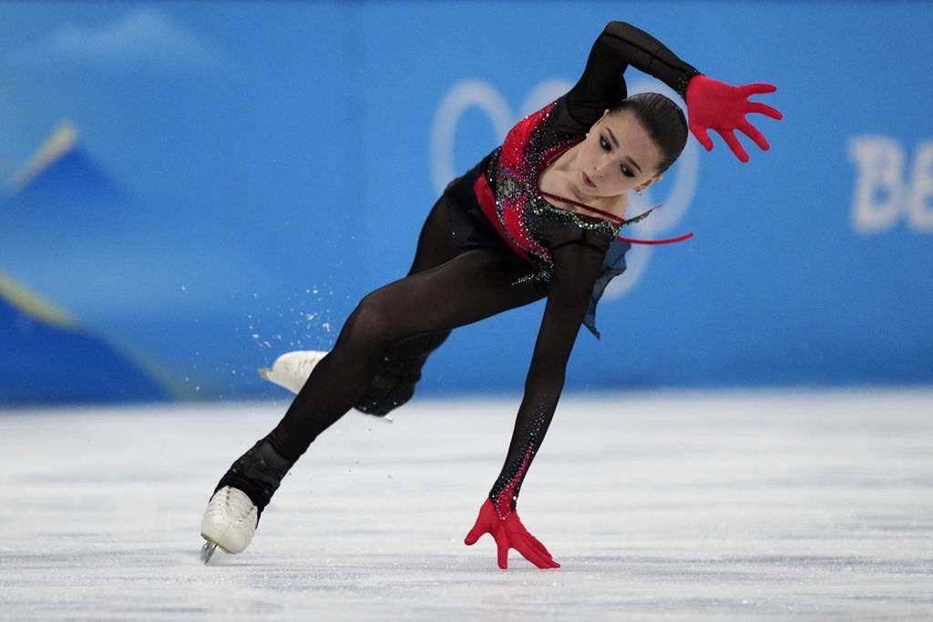 Kamila Valieva falls in the women's free skate program during the figure skating competition at the 2022 Winter Olympics on Feb. 17, 2022, in Beijing.