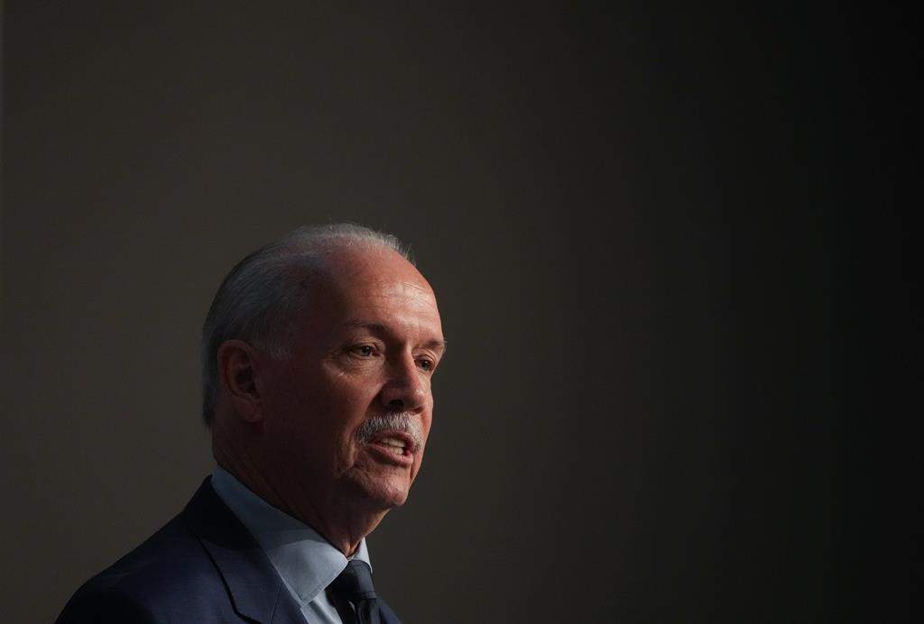 B.C. Premier John Horgan addresses the Union of B.C. Municipalities Convention, in Whistler, B.C., on Friday, Sept. 16, 2022. THE CANADIAN PRESS/Darryl Dyck.