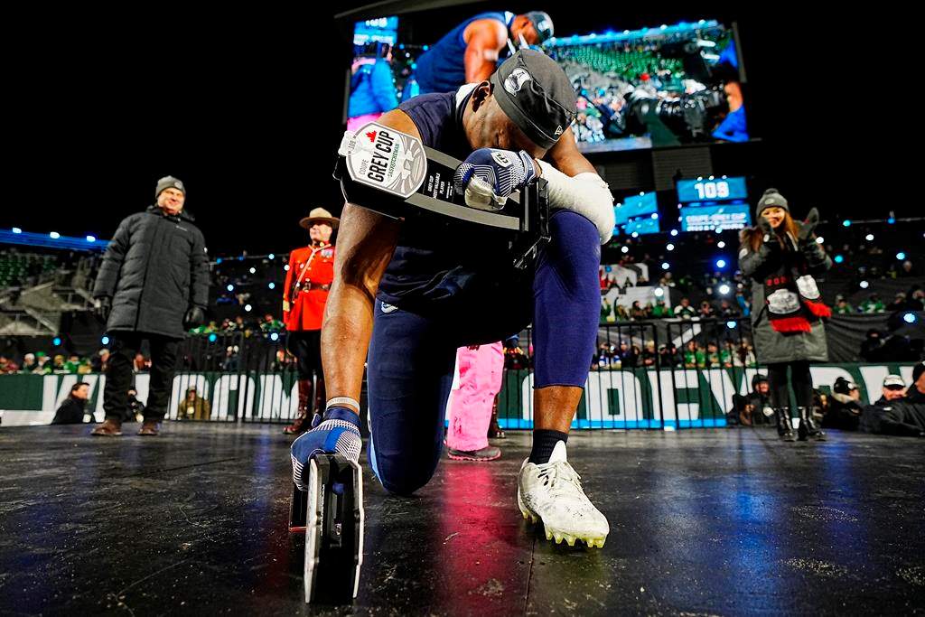 Toronto Argonauts linebacker Henoc Muamba celebrates after being named the Grey Cup’s Most Valuable Player and Most Valuable Canadian after defeating the Winnipeg Blue Bombers in the 109th Grey Cup at Mosaic Stadium in Regina, Sunday, Nov. 20, 2022. THE CANADIAN PRESS/Jonathan Hayward