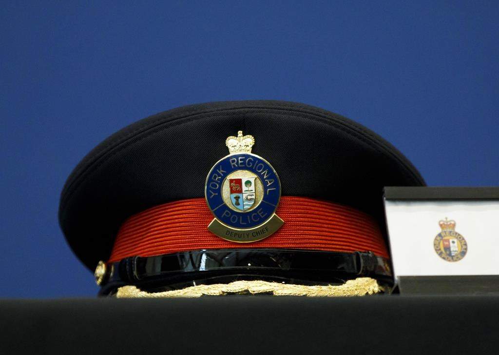 A York Regional Police deputy chief's hat is seen on a table during a press conference at the YRP Headquarters in Aurora, Ont., Monday, March 11, 2019.