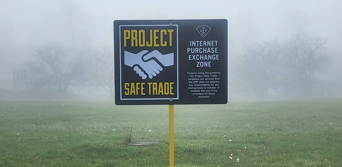 Signage at the Peterborough County OPP detachment parking lot.