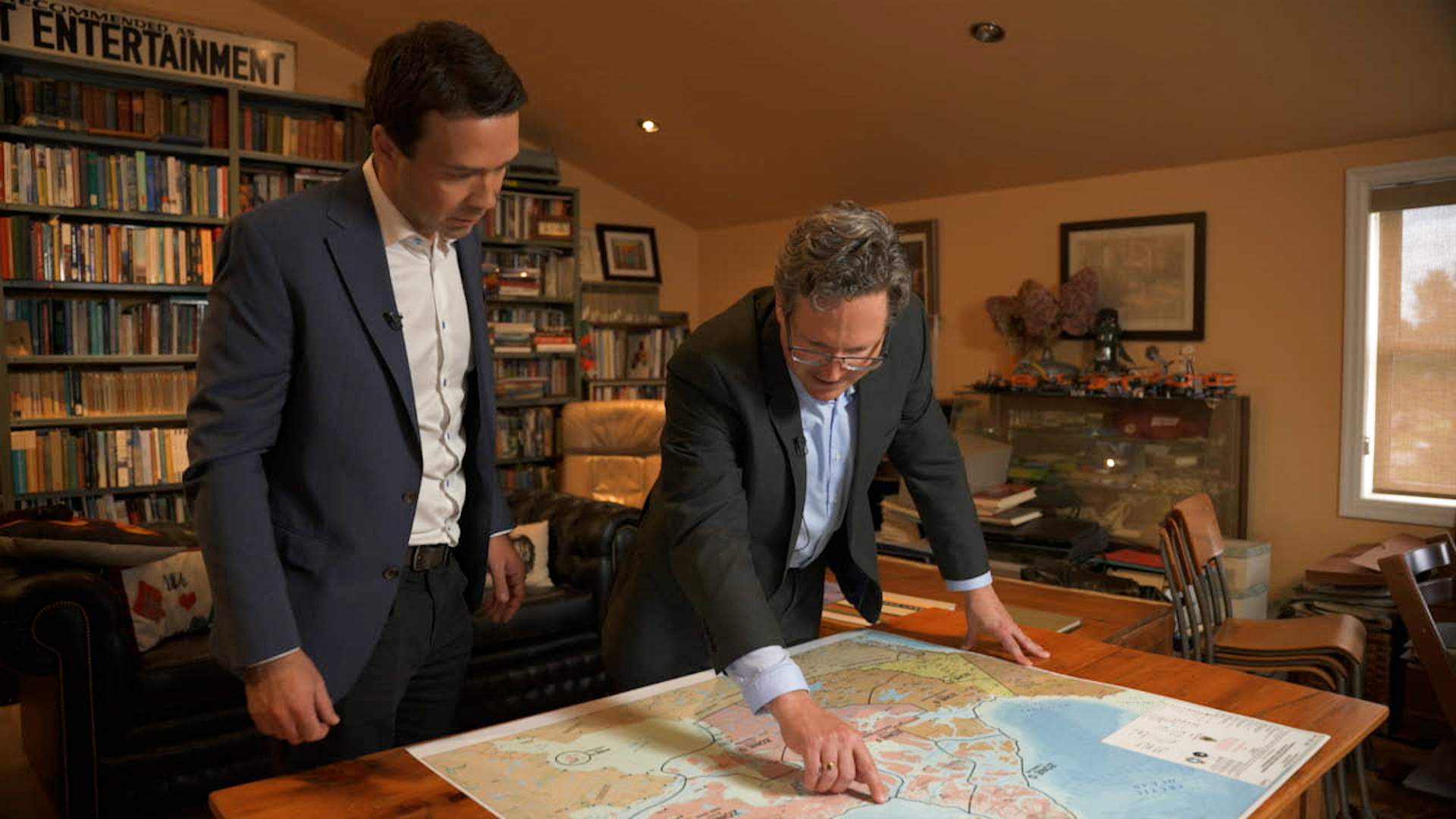 Arctic Expert Whitney Lackenbauer with The New Reality’s Jeff Semple, pointing to areas of the Arctic that could be contentious in a global power play of the region.