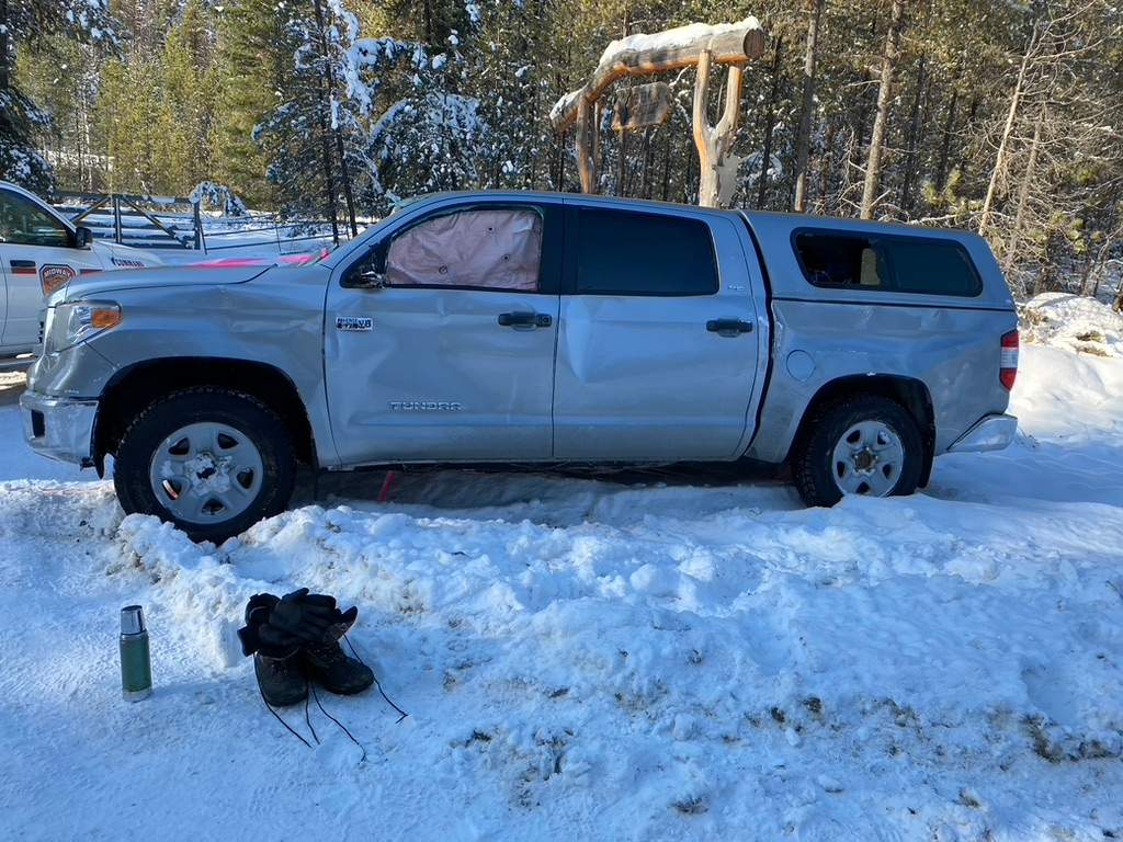 Another photo showing the damaged truck after it had been flipped onto its wheels.