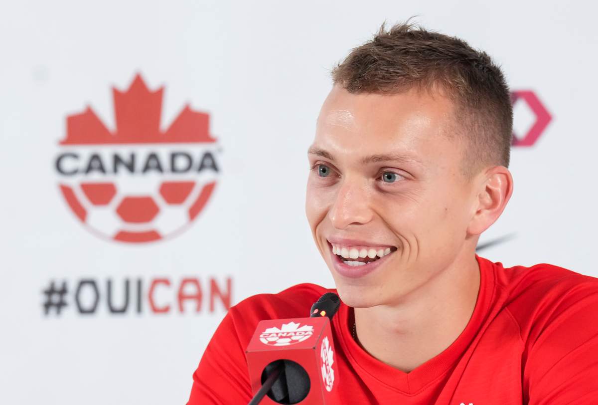 Canada defender Alistair Johnston speaks to the media during a press conference at the World Cup in Doha, Qatar, Friday, Nov. 25, 2022.