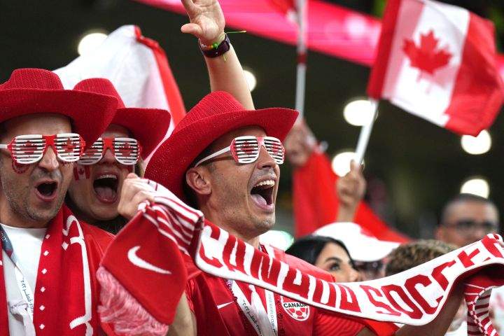 Canada fans cheer as the team arrives on the field to warm up ahead of Group F World Cup soccer action against Belgium at Ahmad bin Ali Stadium in Al Rayyan, Qatar, on Wednesday, Nov. 23, 2022.