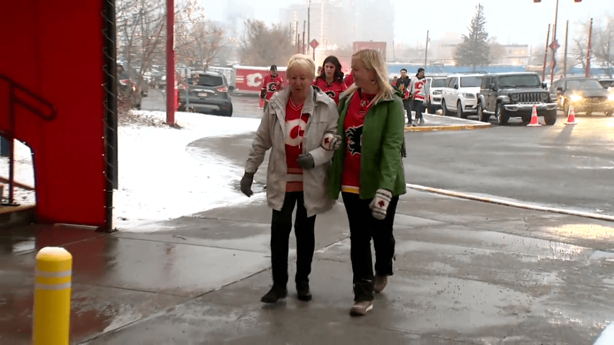 Calgary Flames fan Jess Taylor and British grandma Pamela Dawber attend the Calgary Flames game on Nov. 1, 2022.