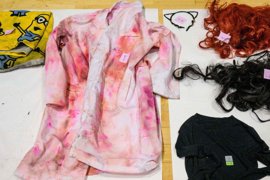 Clothing and wigs retrieved by police after a deadly stampede of Halloween revellers.