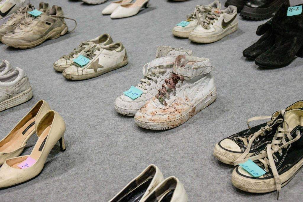 Blood tainted shoes retrieved by police from the scene of a fatal Halloween crowd surge that killed more than 150 people in the Itaewon district.