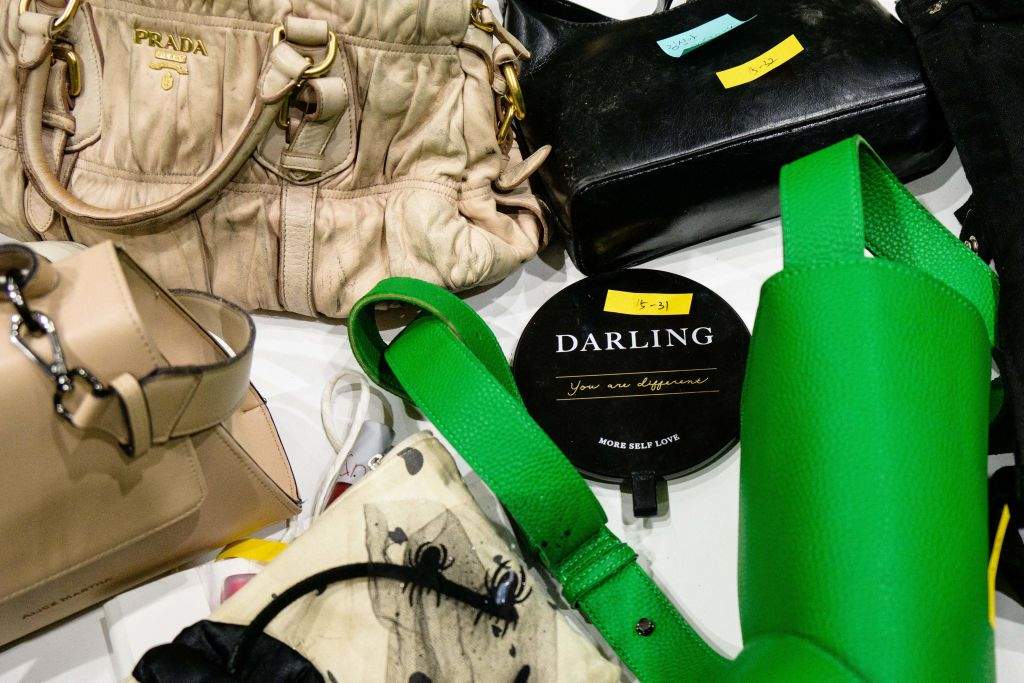 Handbags retrieved by police from the scene of a fatal Halloween crowd surge that killed more than 150 people in the Itaewon district.