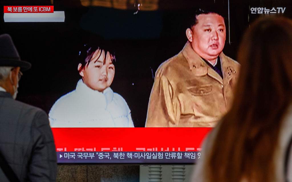A TV screen shows North Korea's KCNA released pictures of North Korean leader Kim Jong Un and his daughter Kim Chu-ae during a news program at the Yongsan Railway Station in Seoul, South Korea. North Korean leader Kim Jong-un declared a resolute nuclear response to threats by the United States during an on-site inspection of the country's test-firing of a Hwasong-17 intercontinental ballistic missile (ICBM) earlier this week, Pyongyang's state media said 19 November. The missile, launched from Pyongyang International Airport, flew 999.2 kilometers for 4,135 seconds at an apogee of 6,040.9km and landed in the international waters of the East Sea, according to the Korean Central News Agency (KCNA). The KCNA released several photos that showed his daughter named Kim Chu-ae in a white winter jacket and black pants standing and walking together with Kim in front of the missile that sat on a launch truck. The daughter was also seen along with her mother, Ri Sol-Ju, watching her father as he instructed military officials. It marked her first official appearance in state media.