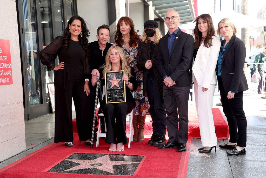 Chair of the Hollywood Chamber of Commerce Lupita Sanchez Cornejo, David Faustino, Christina Applegate, Katey Sagal, Sadie Grace LeNoble, Mitch O’Farrell, Linda Cardellini and Liz Feldman pose with Christina Applegate’s star during her Hollywood Walk of Fame Ceremony at Hollywood Walk Of Fame on Nov. 14, 2022 in Los Angeles.