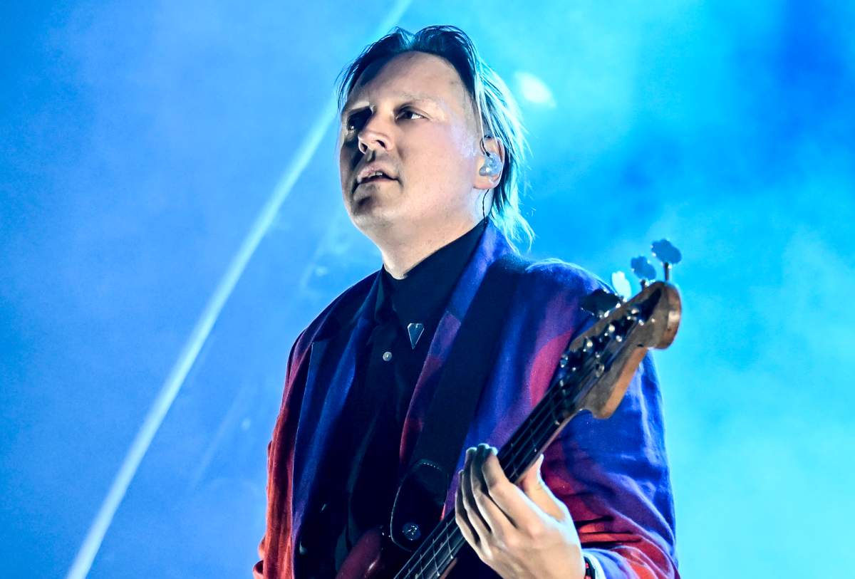 Win Butler performing with Arcade Fire