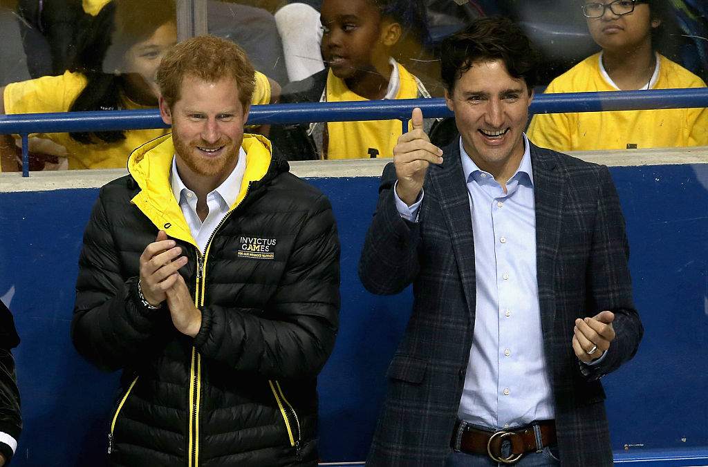 Prince Harry chats with Canadian Prime Minister Justin Trudeau as they watch a sledge-hockey match Mattany at the Athletic Centre on May 2, 2016 in Toronto, Canada.