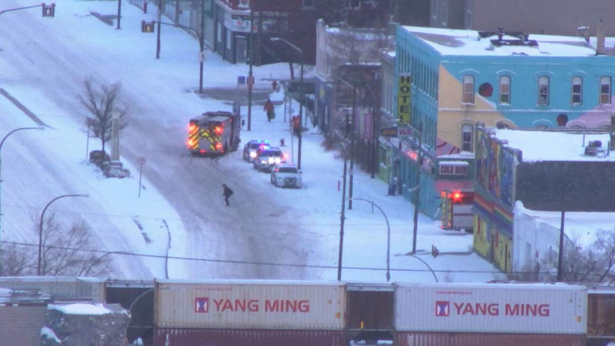 Police and first responders at the scene of a stabbing on Main Street Friday morning.
