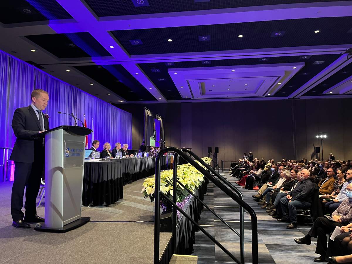 London, Ont., Mayor Josh Morgan stands on stage at RBC Place and is joined by fellow councillors as he addresses a crowd gathered inside of RBC Place during city council's inaugural meeting.
