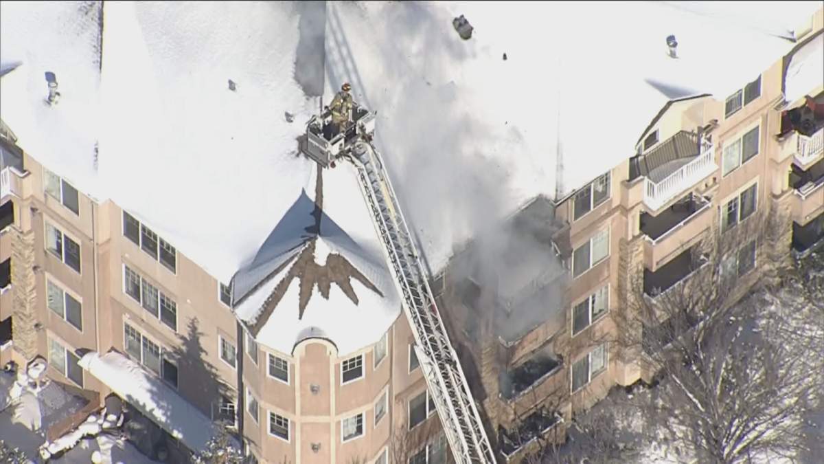 Calgary firefighters battle a fire in the southeast Midnapore neighbourhood on Nov. 10, 2022.