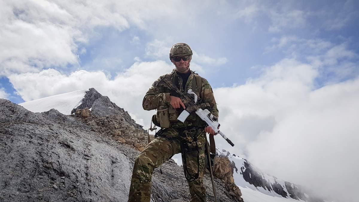 Aaron Dale, now a Toronto police constable, is pictured while on previous military deployment.