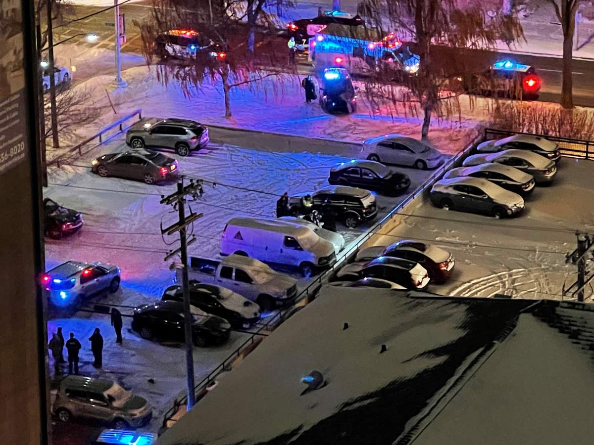 Edmonton police on the scene of what they describe as a targeted shooting that killed a 31-year-old woman earlier this month.