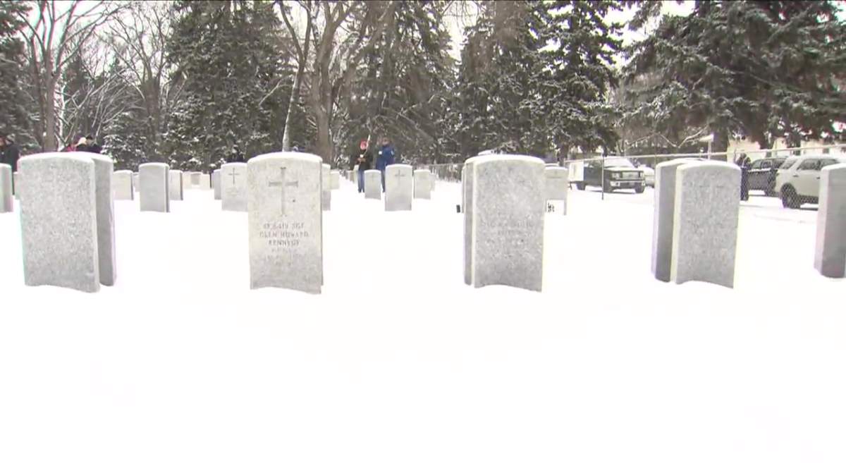 The headstone of a soldier buried at Beechmount Cemetery, seen during the No Stone Left Alone remembrance ceremony in Edmonton, Alta. on Monday, Nov. 7, 2022.