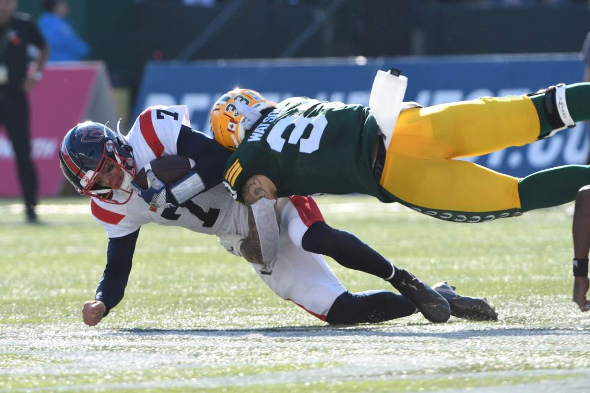 LB Tre Watson makes a tackle in a game against the Alouettes