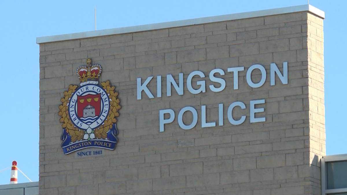 Kingston police sign located in front of the police station on Division Street